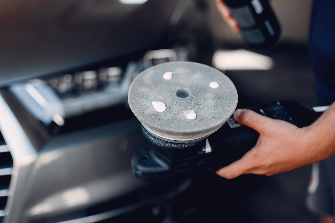 man-polish-car-garage (1)